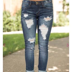 Pink Lily Dark wash distressed jeans. Size 3